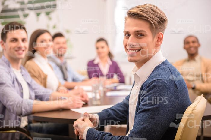 Cheerful Young Man Participates In Training Session Stock Photo