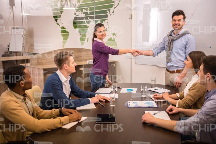Mentor Greets Student Stock Photo