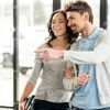 Clients In Dealer Showroom Stock Photo