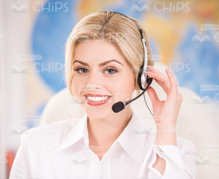 Smiling Business Woman Wearing Headset And Talking On Phone Stock Photo