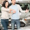 Excited People Buying Car Stock Photo