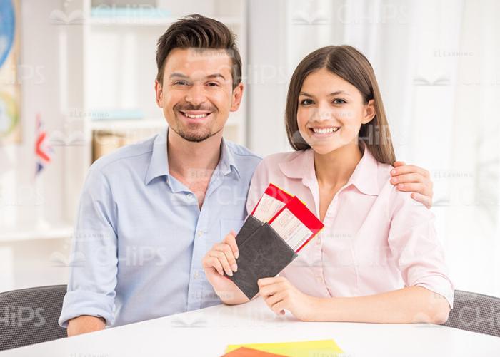 Nice Couple Bought Vacation Tour Stock Photo