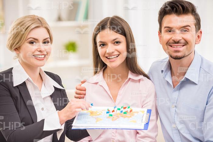 Clients And Travel Manager With Map Stock Photo