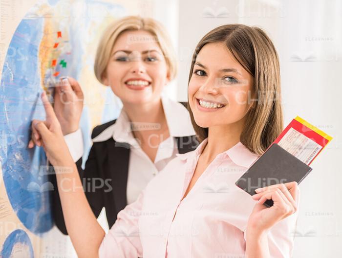Happy Young Woman Boasts With Her Future Vacation Stock Photo