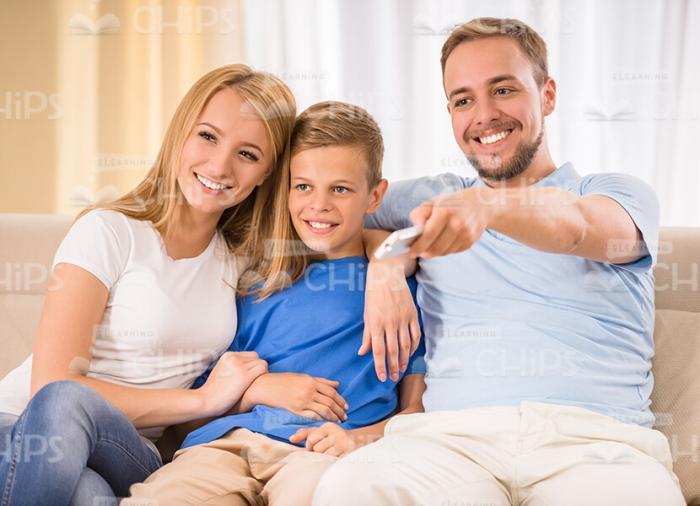 Happy Family Watching TV Stock Photo