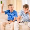 Young Boy Won The Game And Became Extremely Happy Stock Photo