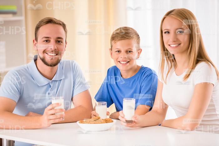 Young Family Having Breakfast Stock Photo