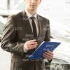 Seller At Car Dealer Shop Stock Photo