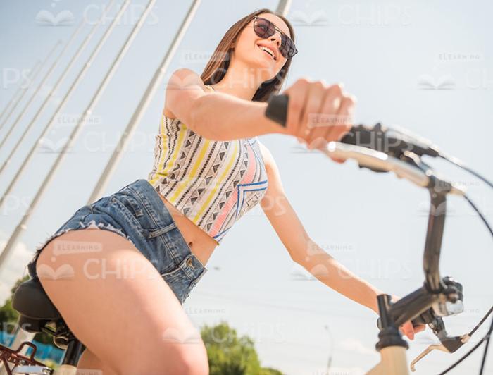 Nice Girl Riding Bicycle Stock Photo