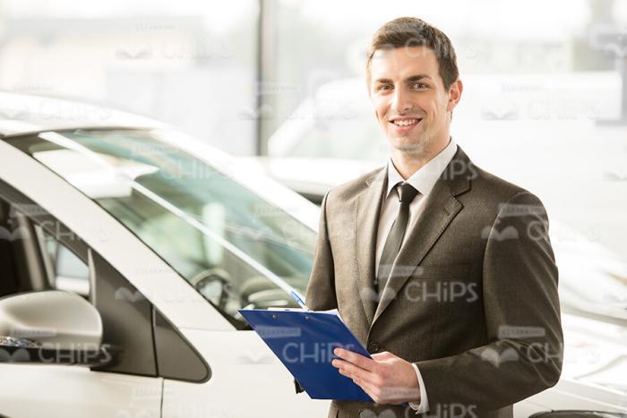 Consultant At Car Store Stock Photo