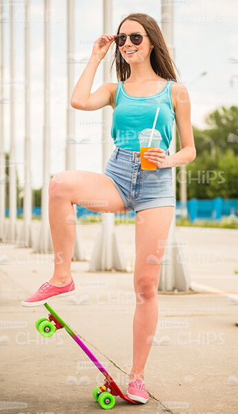 Smiling Girl Standing On Skateboard Stock Photo Smiling Girl Standing On Skateboard Stock Photo