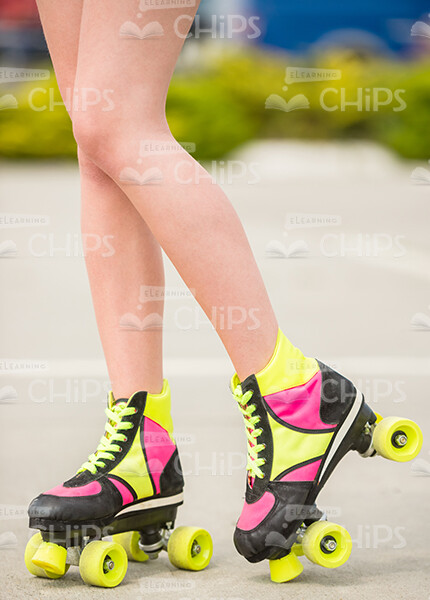 Woman's Legs Wearing Roller Skates Stock Photo