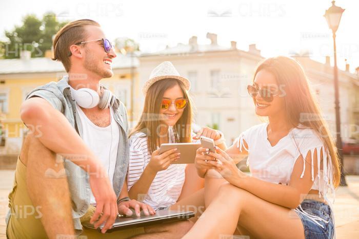 Handsome Young People Resting At Square Stock Photo