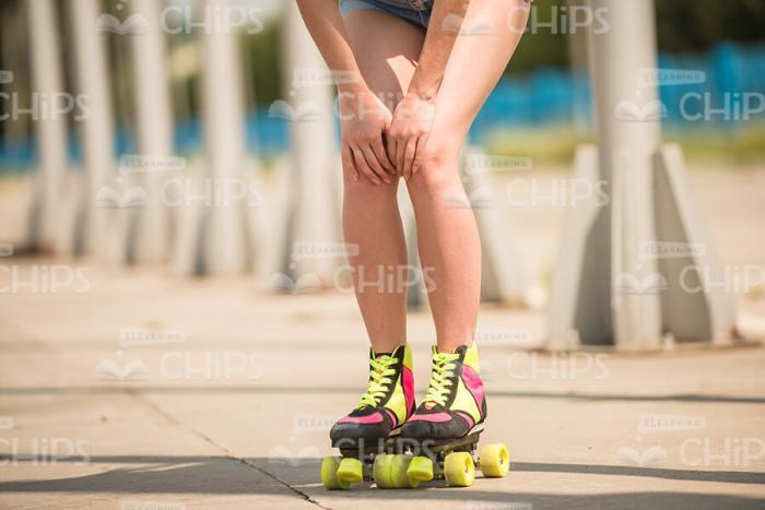 Girl In Rollers Going To Jump Stock Photo
