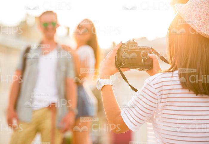 Girl And Boy Posing For Camera Stock Photo