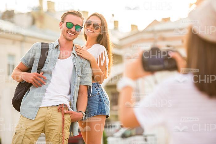 Girl Taking Picture Of Her Friends Stock Photo