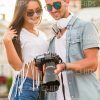 Young Couple Watching Taken Photos Stock Photo