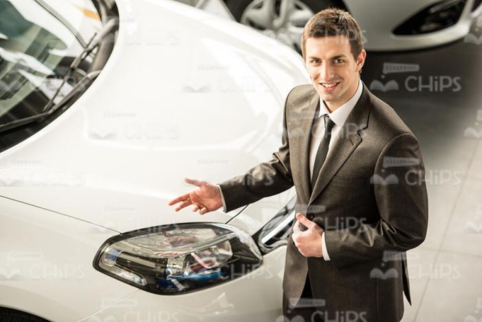 Handsome Car Consultant Top View Stock Photo