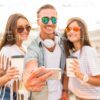 Happy Young Friends Taking Selfie Together