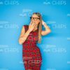 Shy Young Girl Covering Mouth Stock Photo