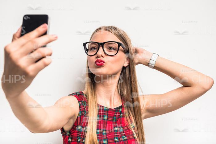 Pretty Female Model Taking Selfie Stock Photo