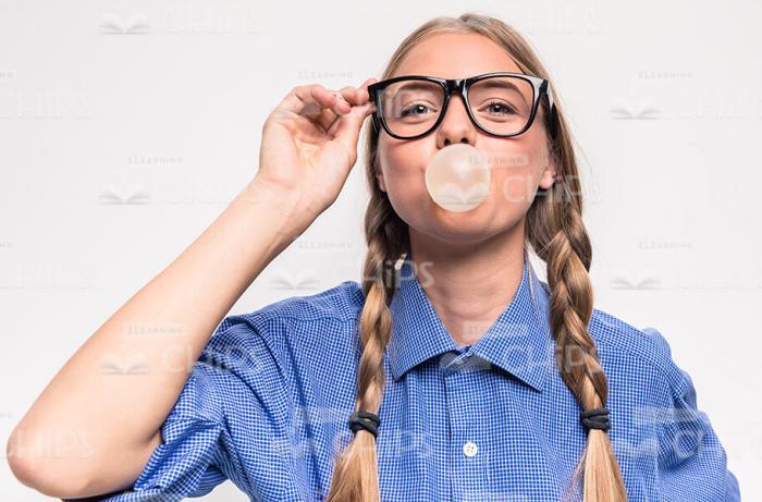 Nice Young Girl With Bubble Gum Stock Photo