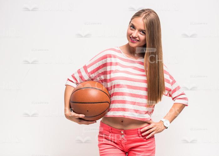Smiling Girl With Basket Ball Stock Photo
