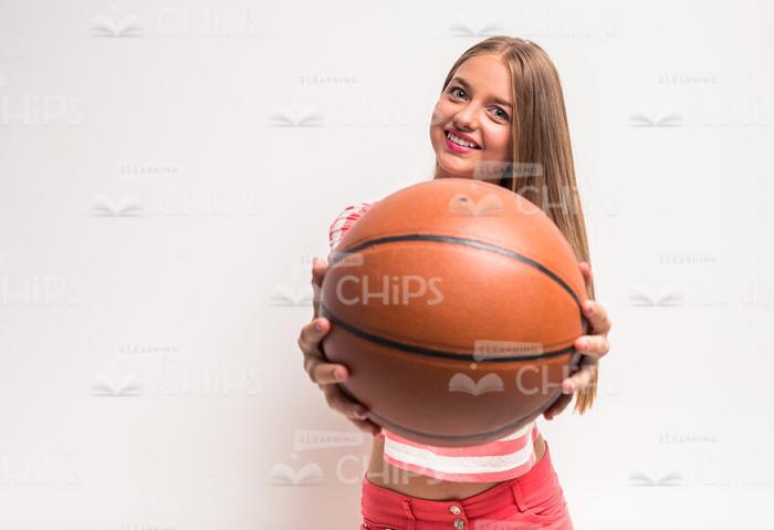 Pretty Girl Holding Basketball Stock Photo