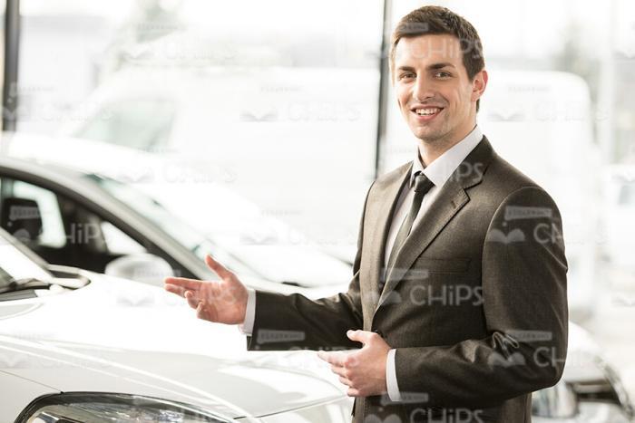 Handsome Vehicle Seller Stock Photo