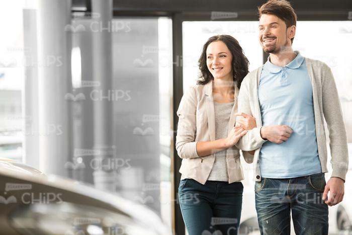 Confident Couple Looking For New Car Stock Photo