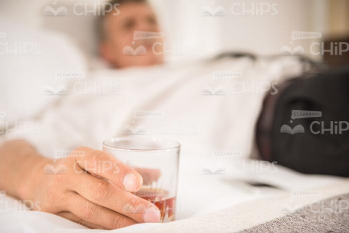 Close Up Stock Photo Of Glass In Man's Hand