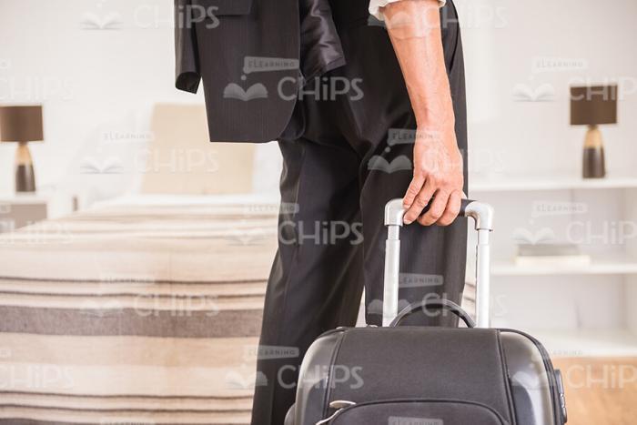 Close Up Stock Photo Of Man's Hand Holding Suitcase