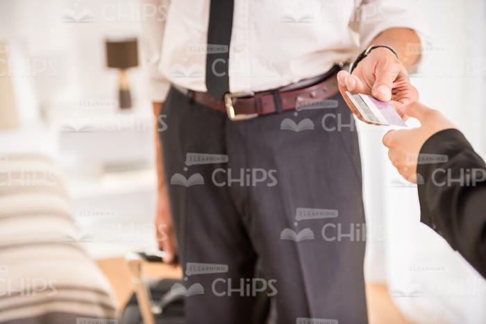 Close Up Stock Photo Of Man Giving His Payment Card