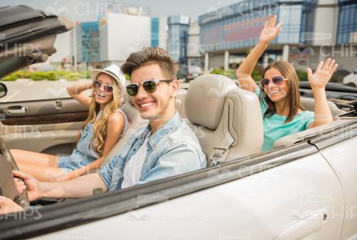 Several Young People Going For Drive Stock Photo