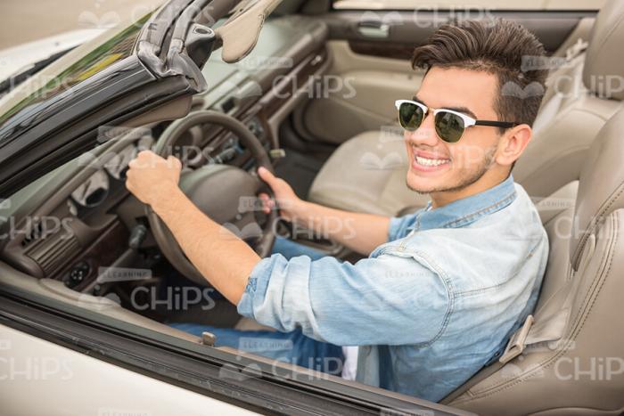 Handsome Man Driving His Car Stock Photo