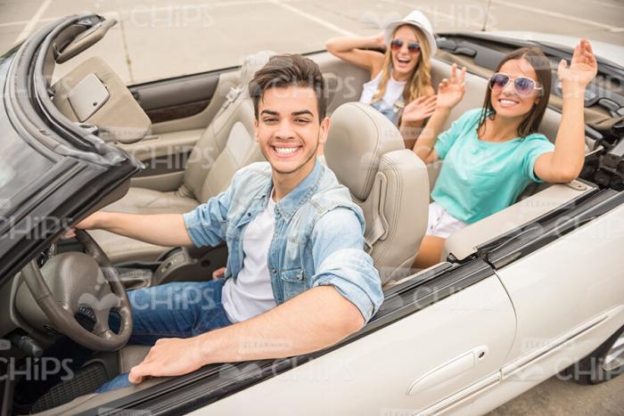 Excited Young Friends In Car Stock Photo