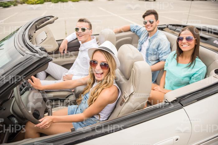 Handsome Friends Driving Car Stock Photo