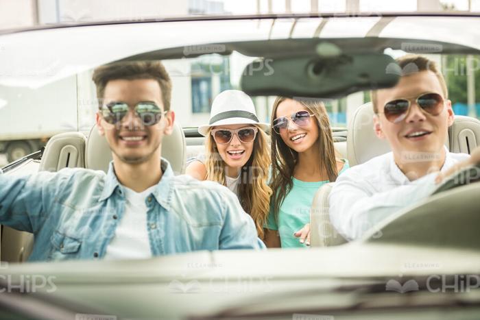 Nice People Sitting In Convertible Car Front View Stock Image