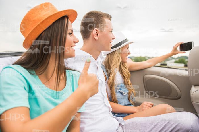 Few Handsome Friends Making Selfie In Cabriolet Car Stock Photo