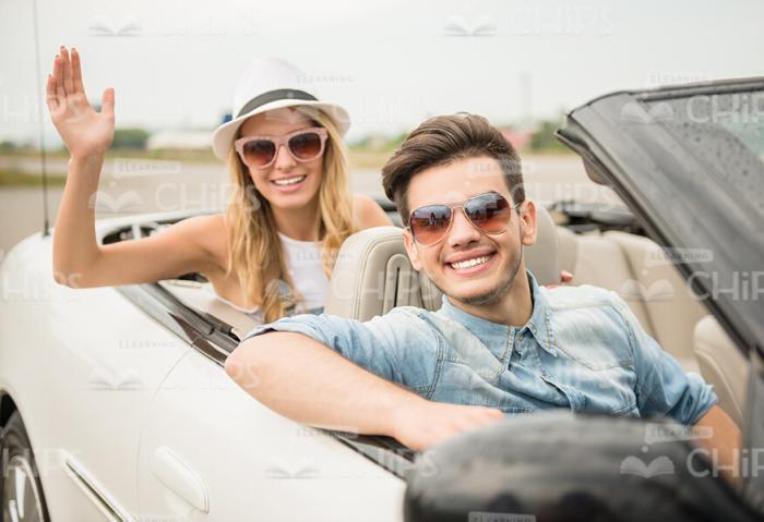 Smiling People Sitting In Car Stock Photo