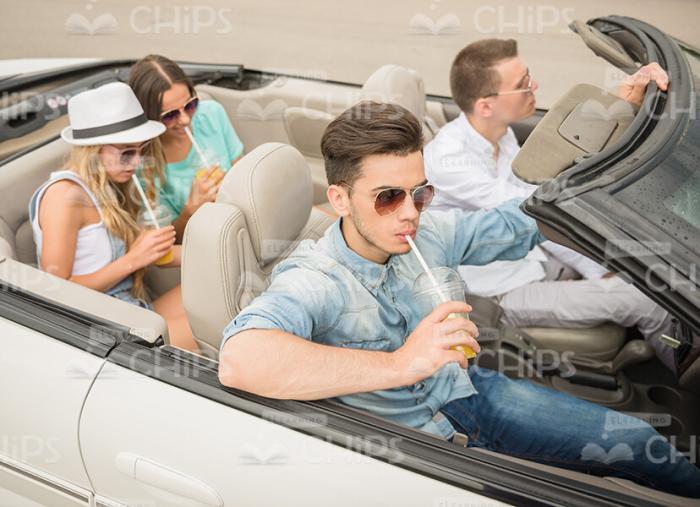 Handsome People Driving In Cabriolet Car Stock Photo