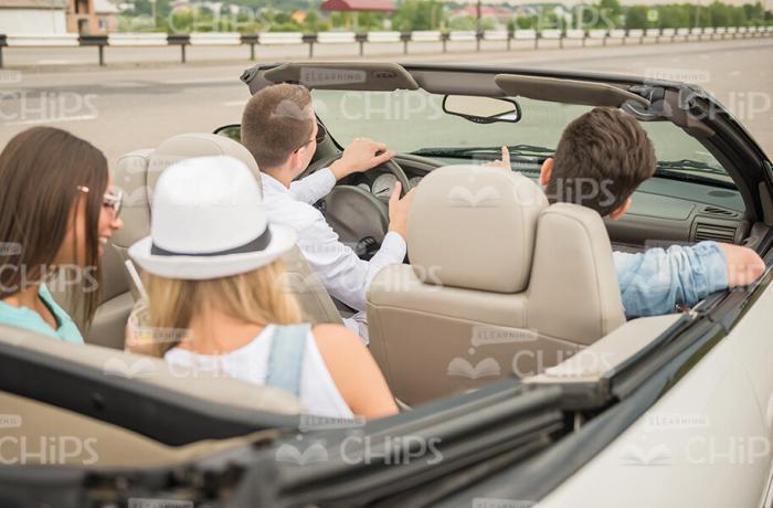 People Driving In Cabriolet Stock Photo