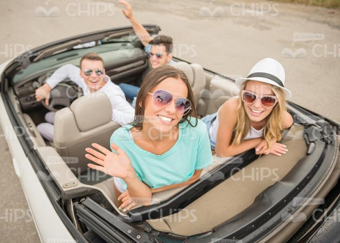 Smiling Girls Look Very Happy While Sit In Cabriolet Car Stock Photo