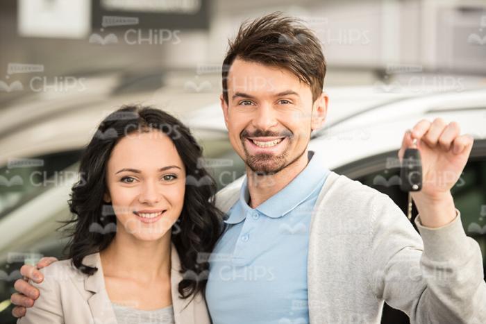 Close Up Couple With Keys To The New Car Stock Photo