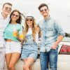Four Handsome Friends Standing In Front Of Car Stock Photo