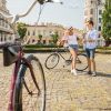 Nice Couple Talking Next To Bikes Stock Photo