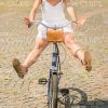 Frightened Young Girl Screaming While Cycling Stock Photo