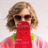 Nice Girl Covering Mouth With Skateboard Stock Photo
