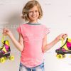 Smiling Girl Holding Roller Skates Stock Photo