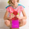 Happy Girl Sitting On Haunches While Holding Skateboard Stock Photo
